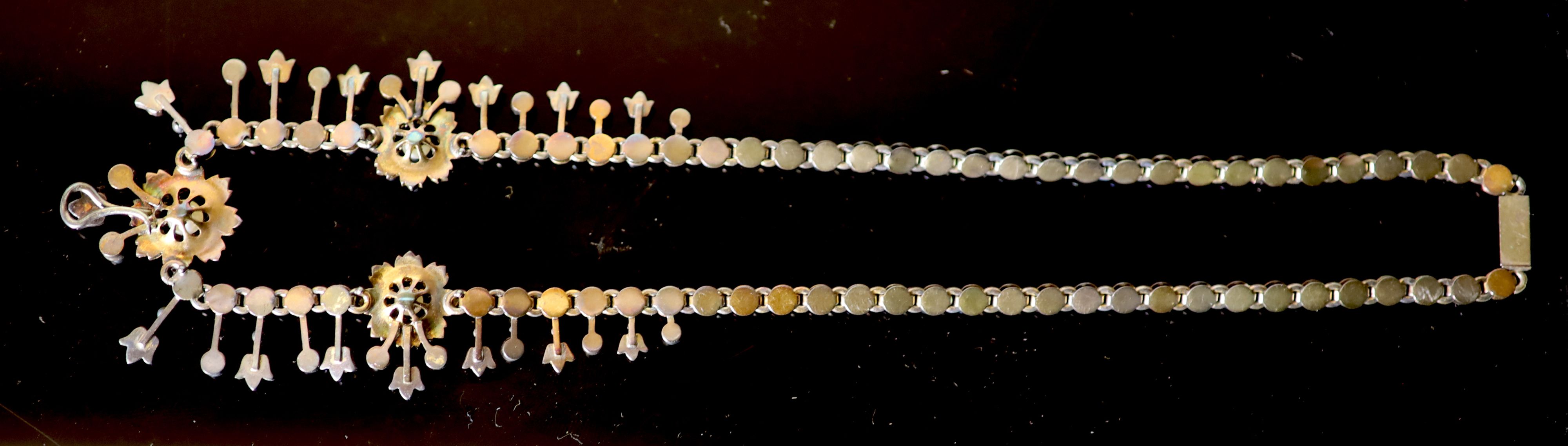 An Edwardian gold and pearl set necklace,